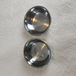 Dog food bowls set of 2, silver colored.  Stainless?